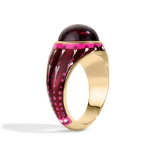 Load image into Gallery viewer, A gold ring with a pink tourmaline cabochon gemstone and pink enamel details as seen on Meryl Streep in The Devil Wears Prada Two.